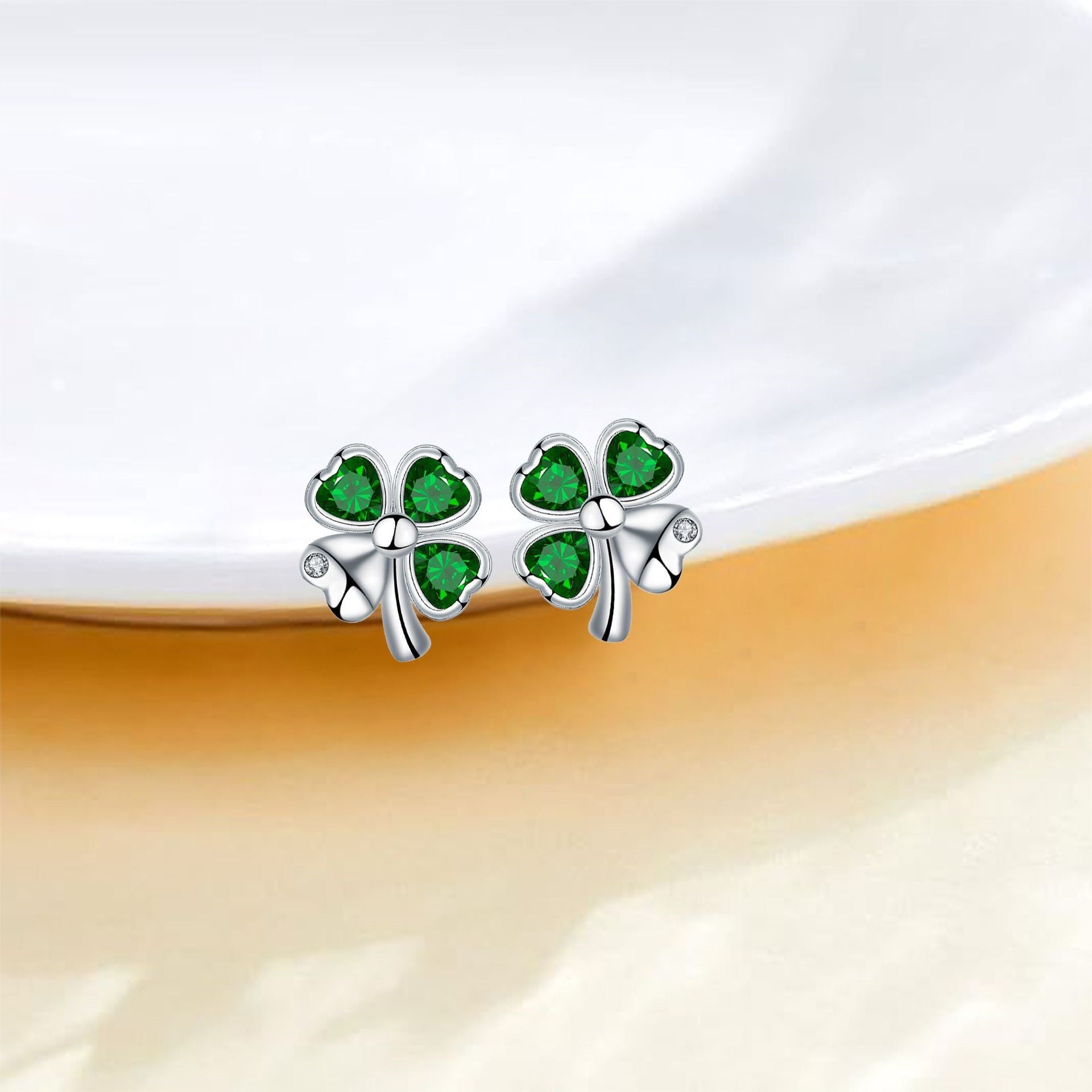 A Set Of Four-leaf Clover Bracelets And Earrings